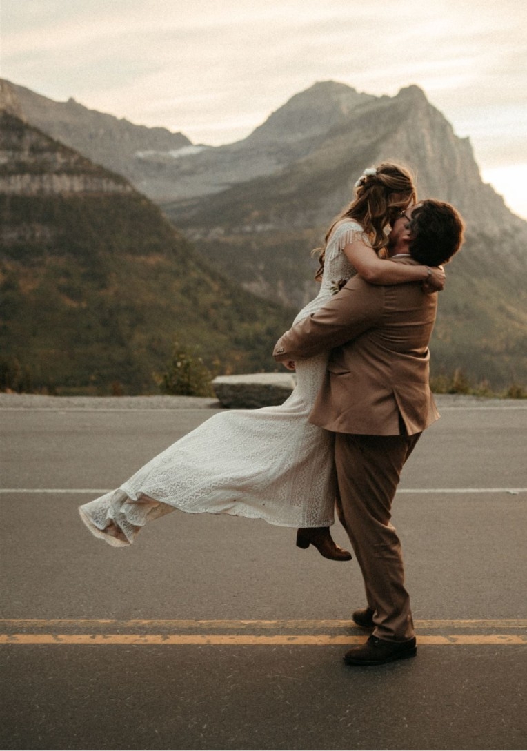 Photo of the real bride and groom near the mountain