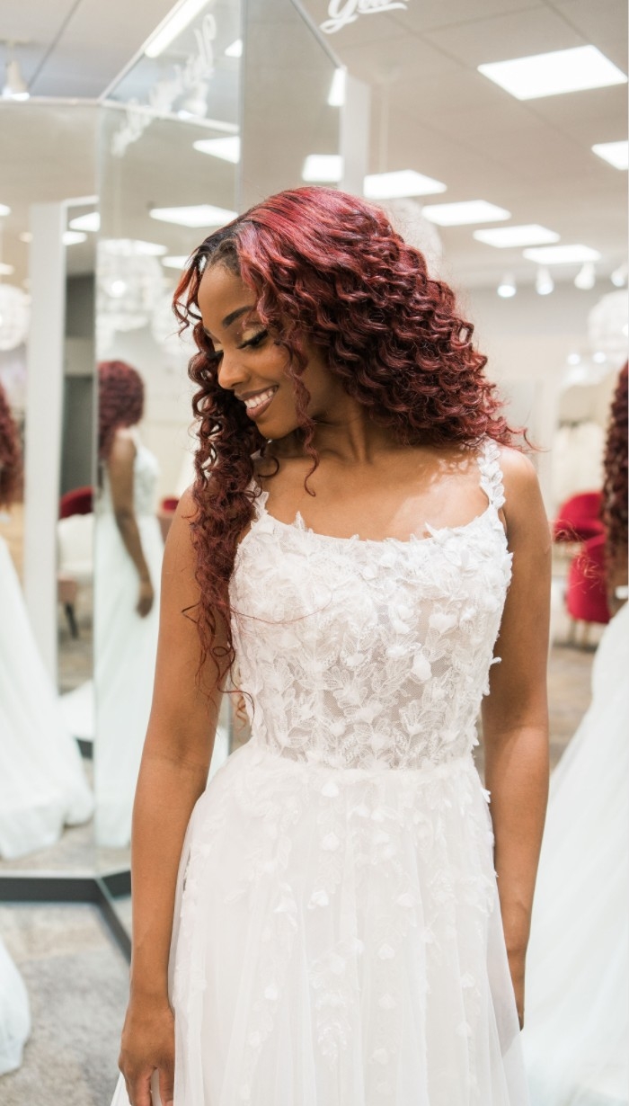 Photo of the model wearing a white gown